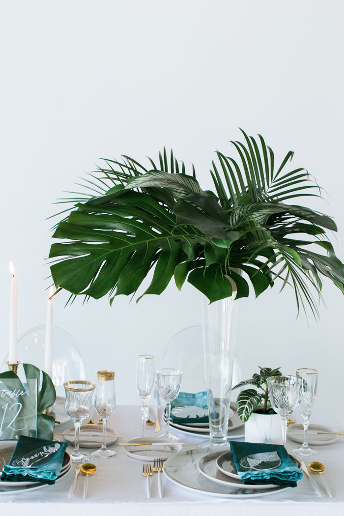 Tall tropical wedding centerpiece.