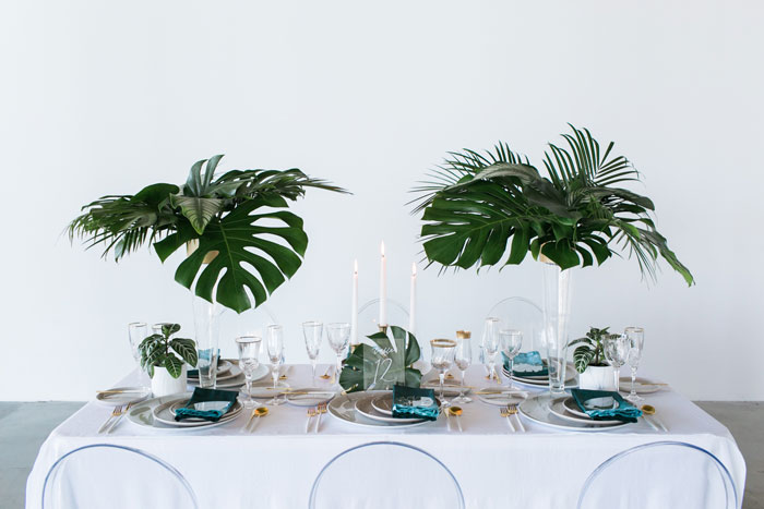 Modern, minimal, and tropical wedding table inspiration.