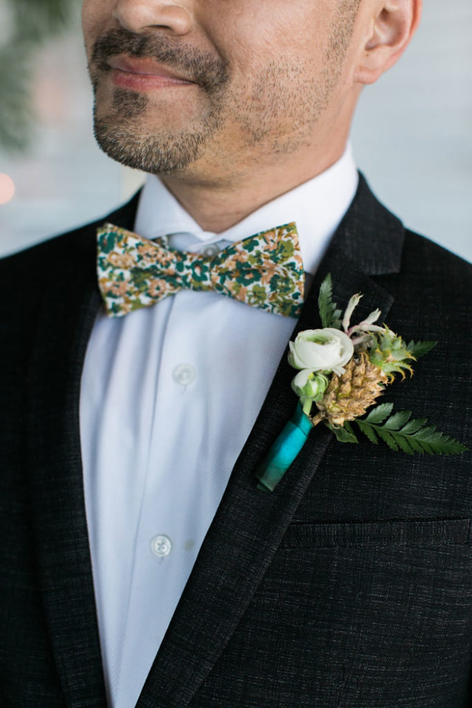 tropical bridal bouquet and tiny pineapple boutonniere.