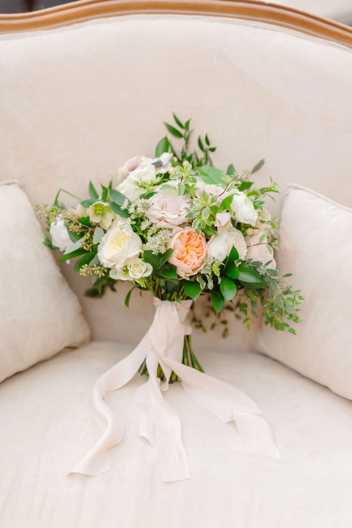 Beautiful cream & blush bridal bouquet featuring a variety of garden roses.