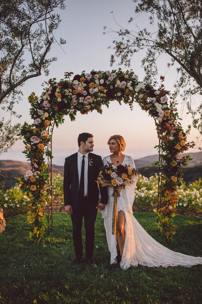 Lush and bohemian fall wedding arch