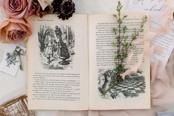 alice in wonderland book & floral flatlay