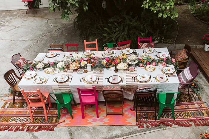 A colorful and bohemian garden party, afternoon tea, or wedding tablescape