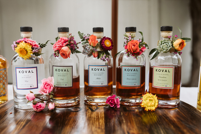 Koval bottles with flower adornments