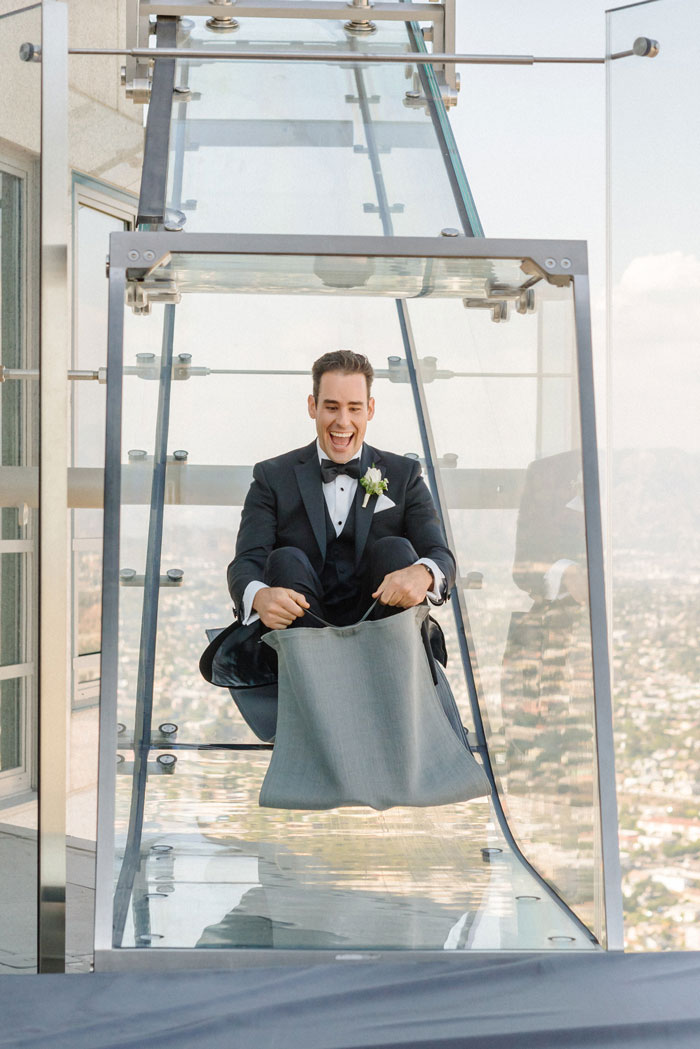 Groom riding slide at Oue Sky Space! 