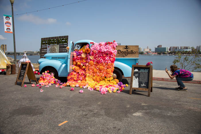 Tabitha Abercrombie of Winston & Main snaps a pic of her colorful floral installation for Don Julio Tequila