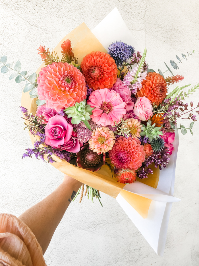 A bold and colorful bouquet created by Tabitha Abercrombie of Winston & Main, featuring local & seasonal blooms like dahlia & zinnia.