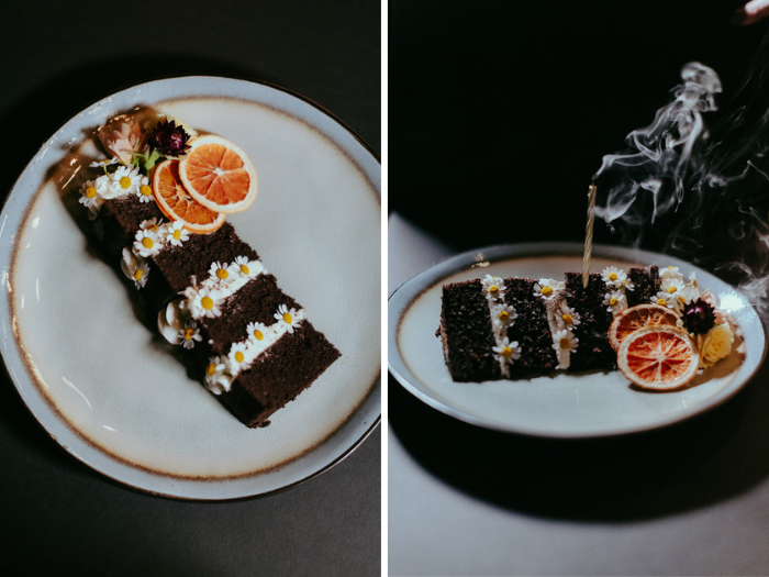 Two pictures of a slice of a chocolate naked cake by Nicole Bakes Cakes. Adorned with fresh florals, citrus accents and an extinguished candle.