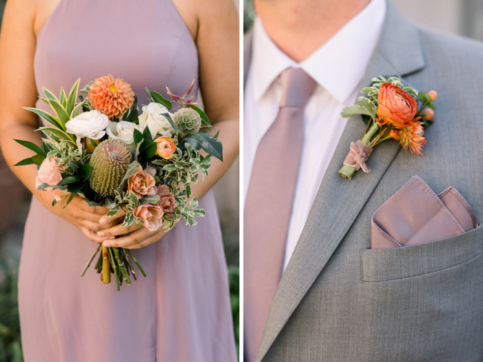 Whimsical and textural bouquet and boutonniere in shades of cream, peach, coral and orange full of ranunculus, dahlias, spray roses and banksia.